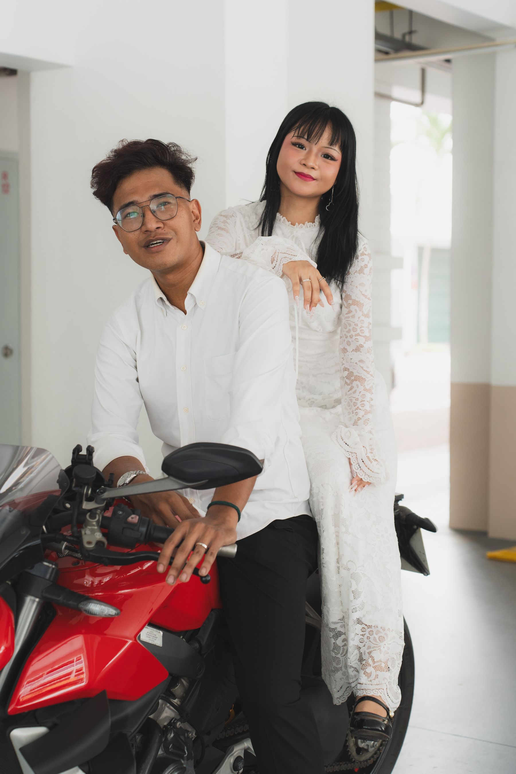Couple portrait with a motorcycle