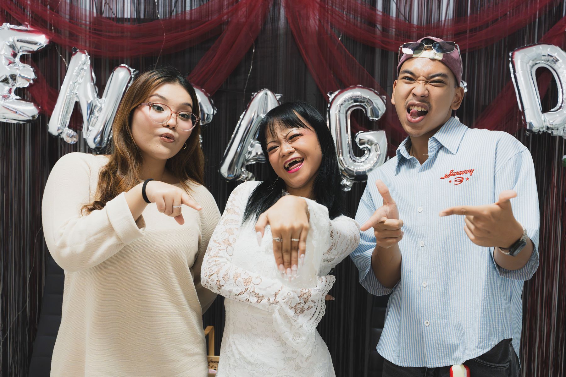 Friends celebrating with the newly engaged couple